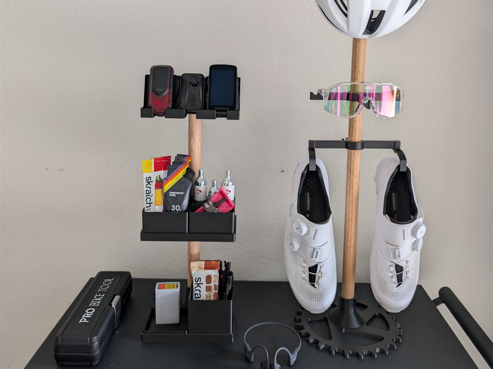 The 4MA modular organizing system mounted in a garage, holding cycling kit.